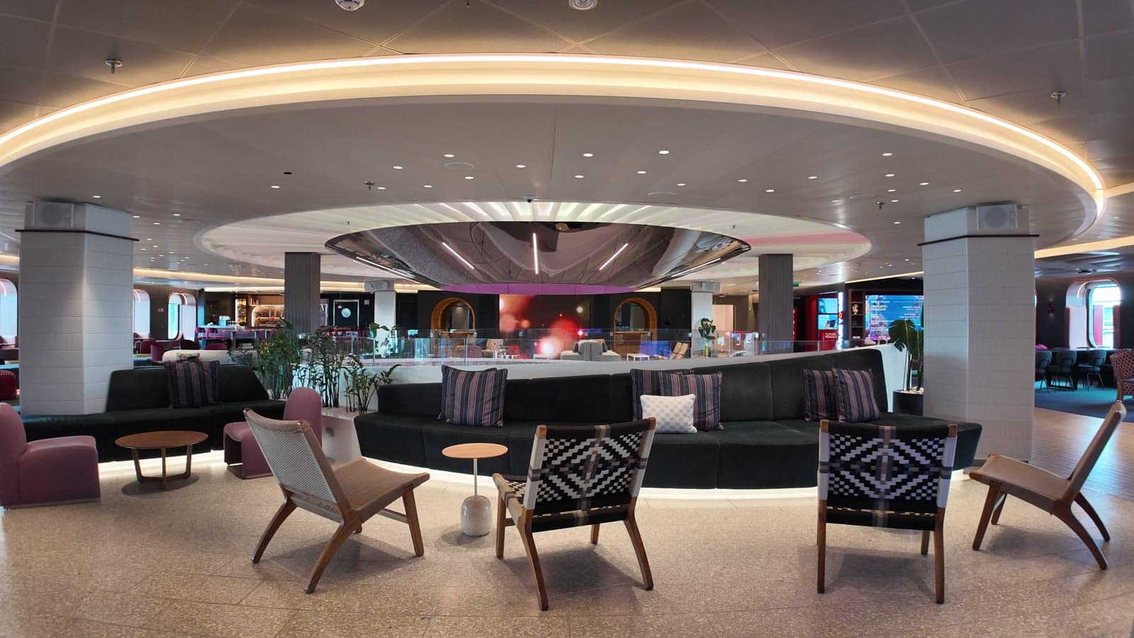 The Roundabout on Valiant Lady refreshed in plum with new furniture groupings