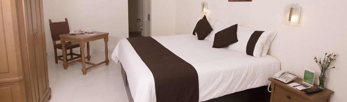 Preferencial con una cama