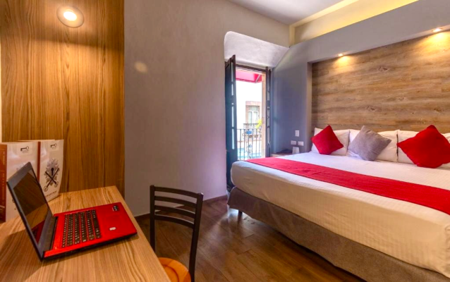 Habitación King con Balcón