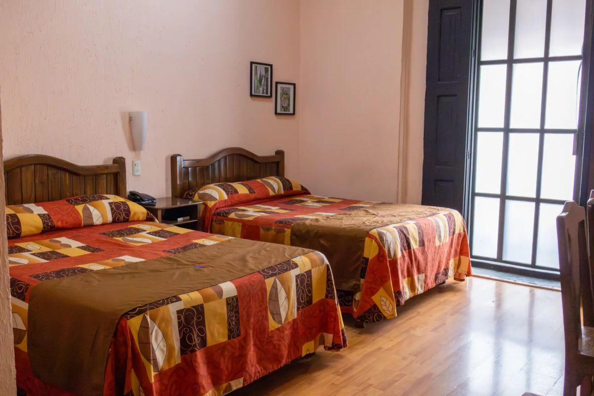 habitacion-dobles-camas.webp