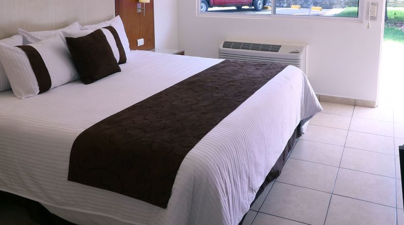 Preferencial con una cama