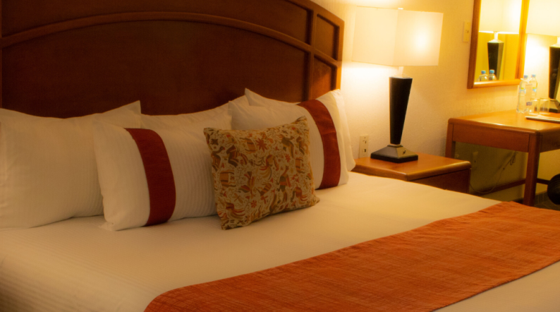 Junior suite con una cama