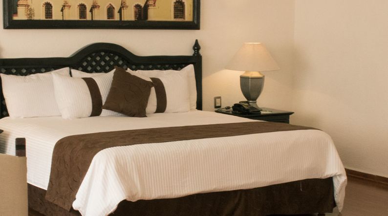 Preferencial con una cama