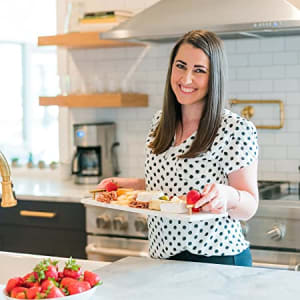 Rachel Rarnsworth holding strawberries