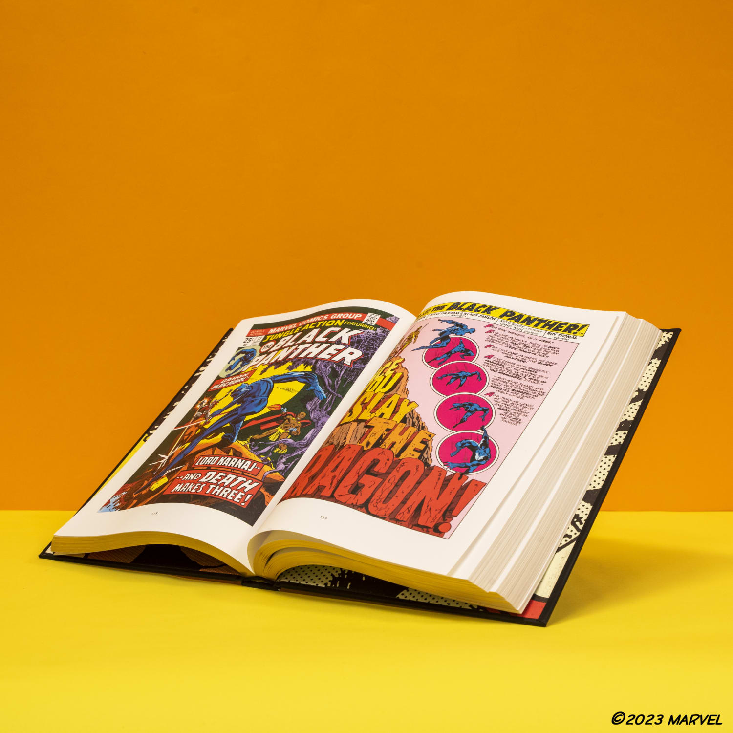Black Panther hardcover interior shots against orange background