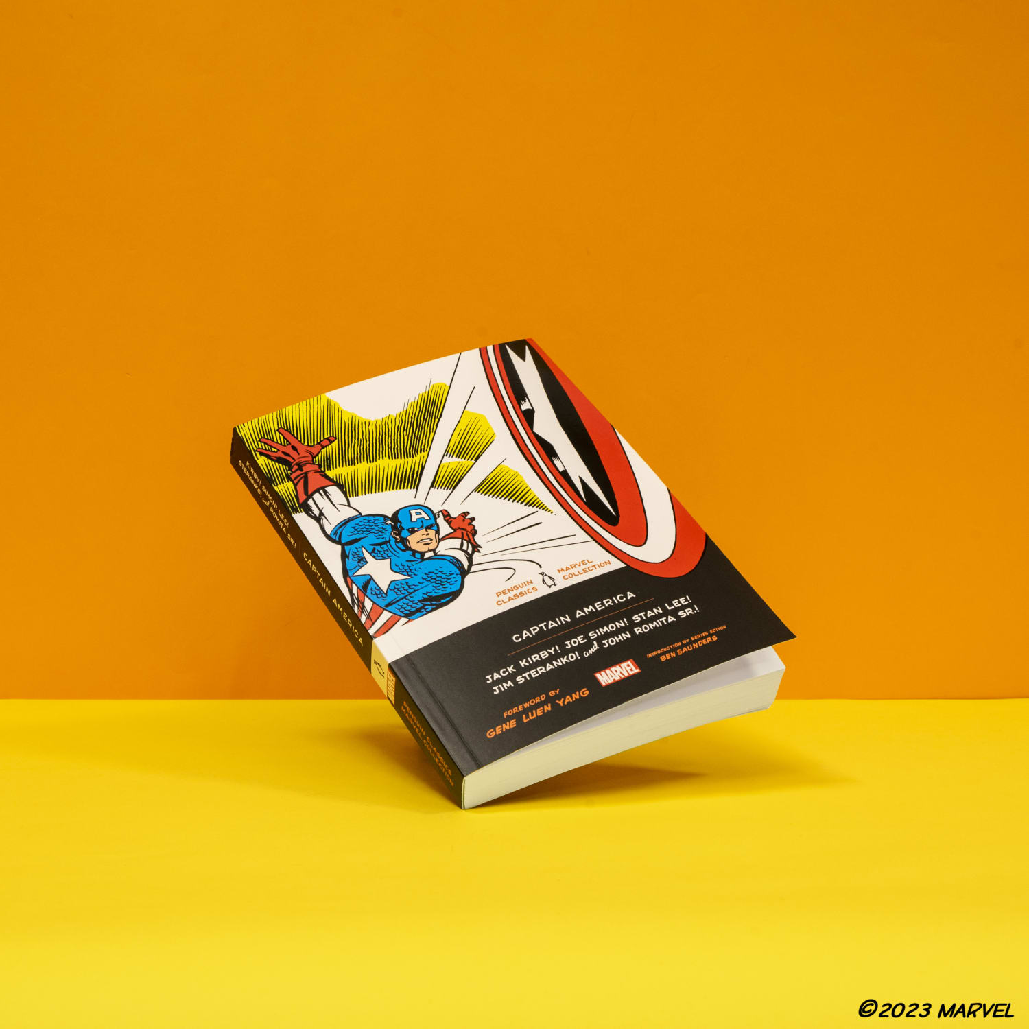 Captain America paperback on orange background