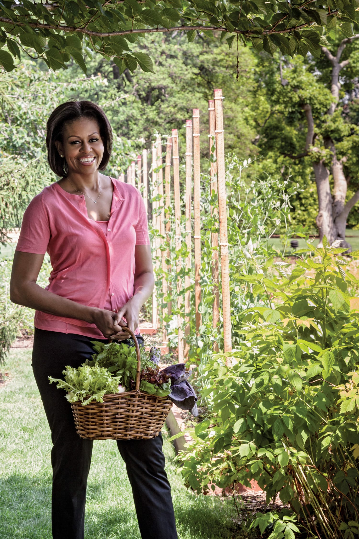 Michelle Obama picking herbs in the White House Garden