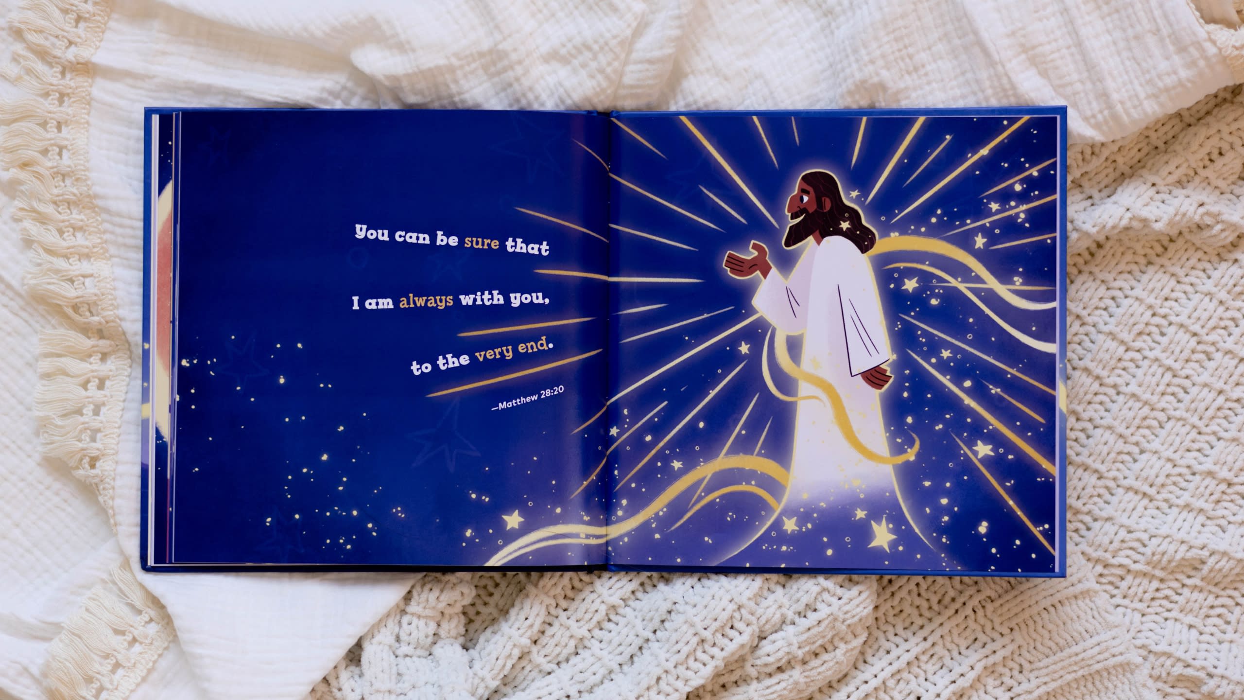 An interior page from the book Never Alone, with an illustrated rendering of Jesus with brown skin and the Bible verse, Matthew 28:20.