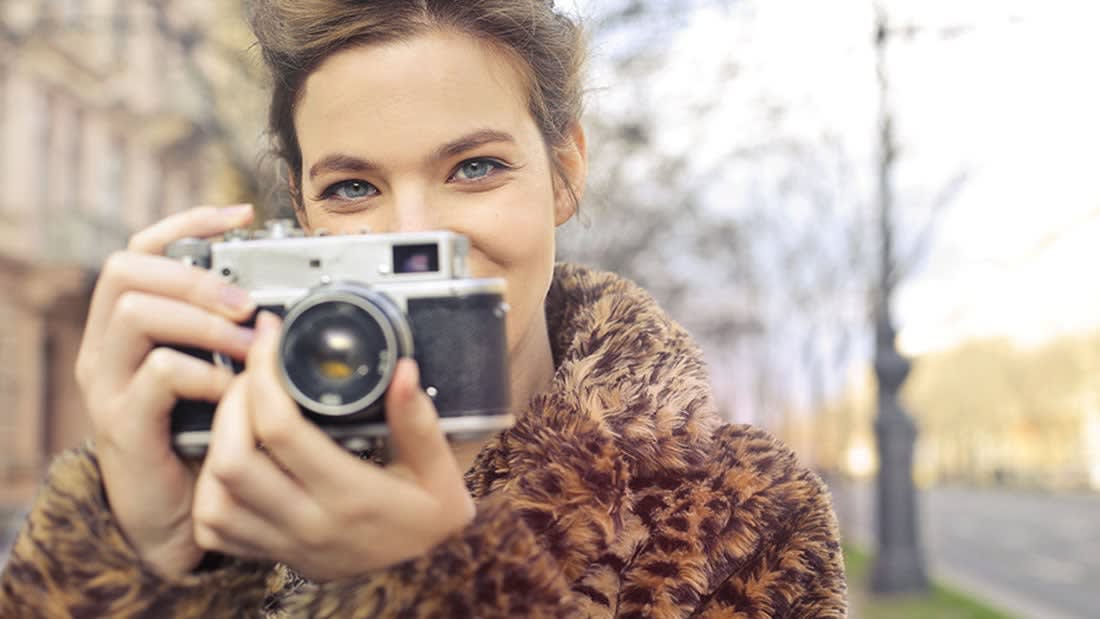 Woman holding a camera