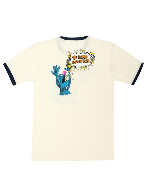 A t-shirt showing Grover from Sesame Street looking distressed with a speech bubble that reads "You turned another page!"