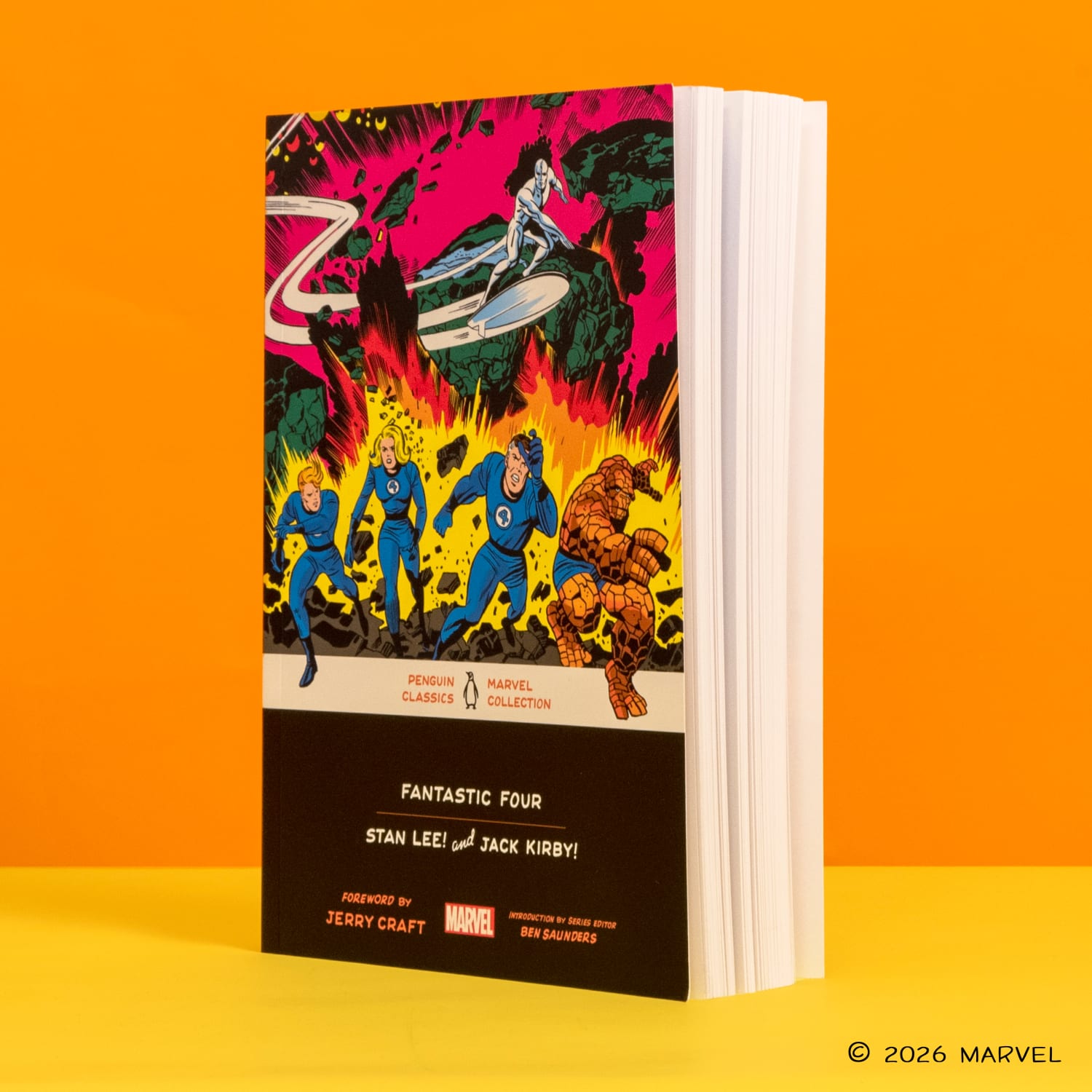 The Fantastic Four paperback standing against an orange background