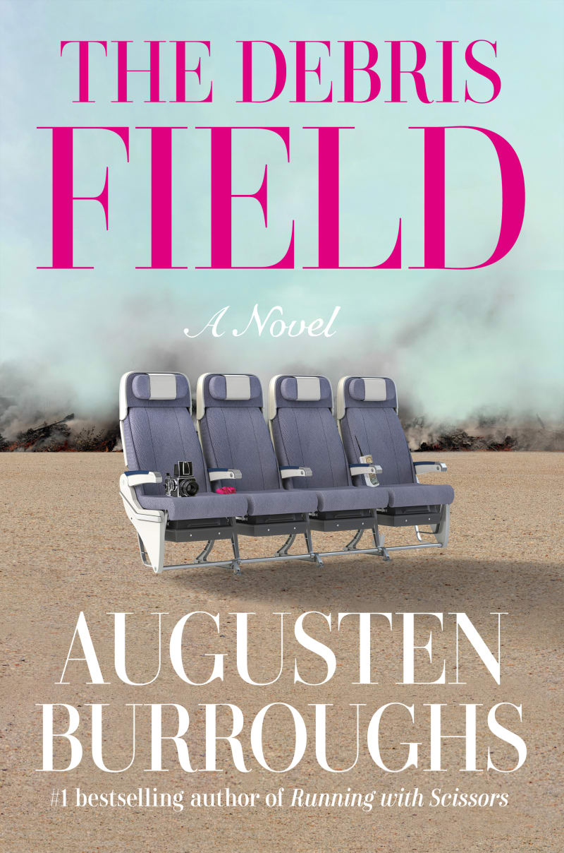 The cover for bestselling author Augusten Burroughs's new novel, The Debris Field, featuring four airplane chairs sitting in a desolate landscape with smoke behind them, and a camera on one of the chairs.