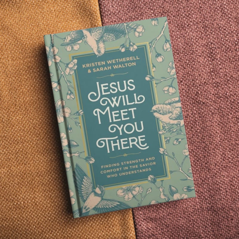 Book on orange and maroon fabric