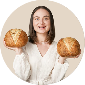 Miha Baking teacher holding bread
