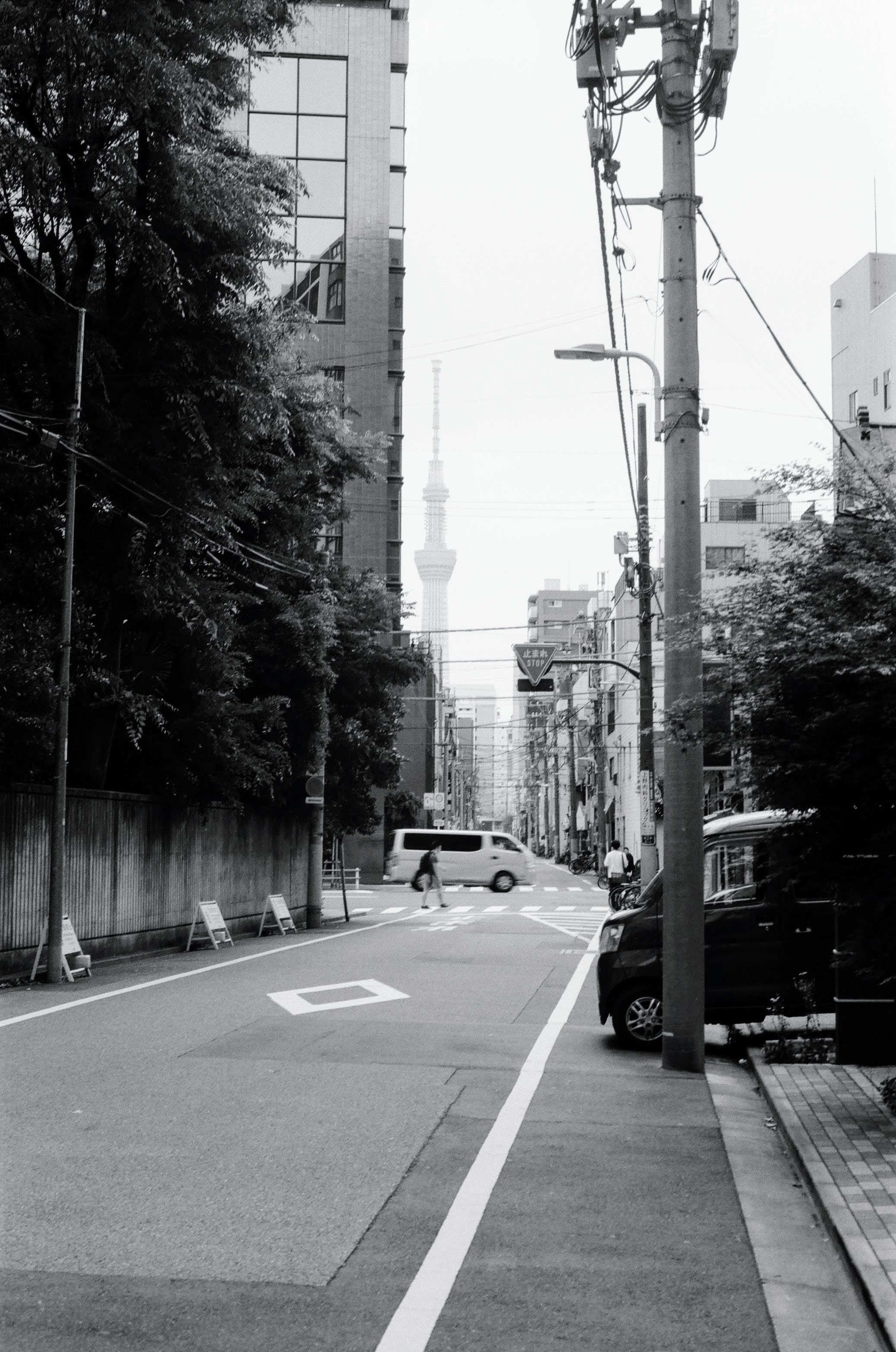 A Japanese back street looking towards the Tokyo Sky Tree in the distance.