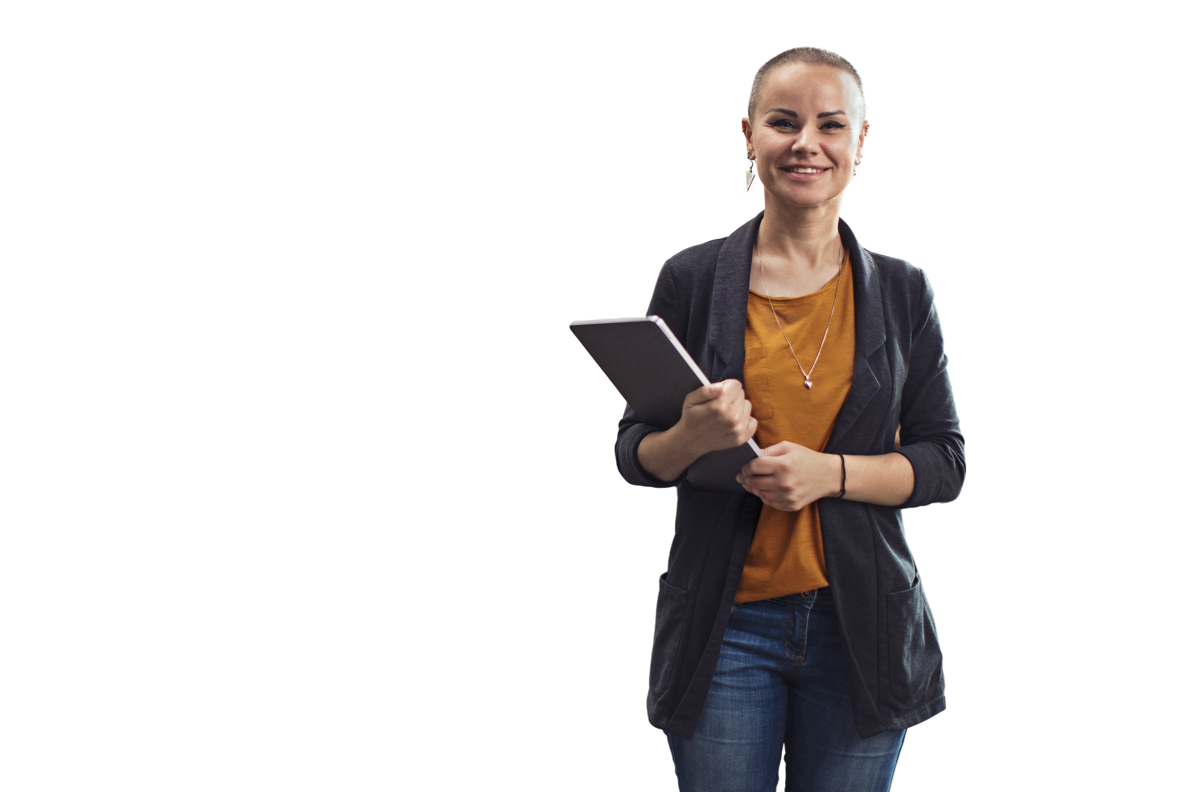 Profile shot of a smiling young woman standing in a co-working office space