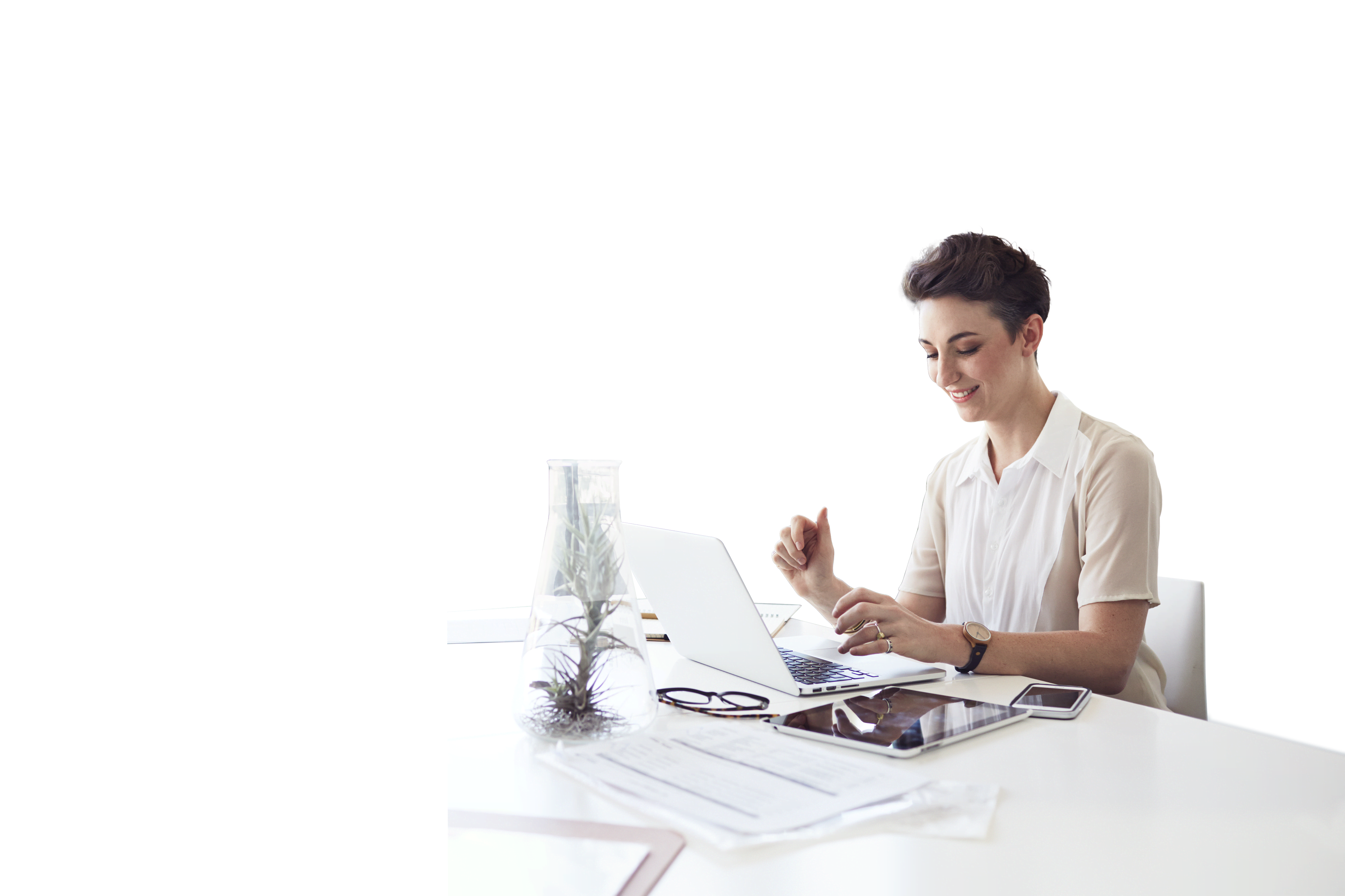 Businesswoman typing on laptop in meetingroom