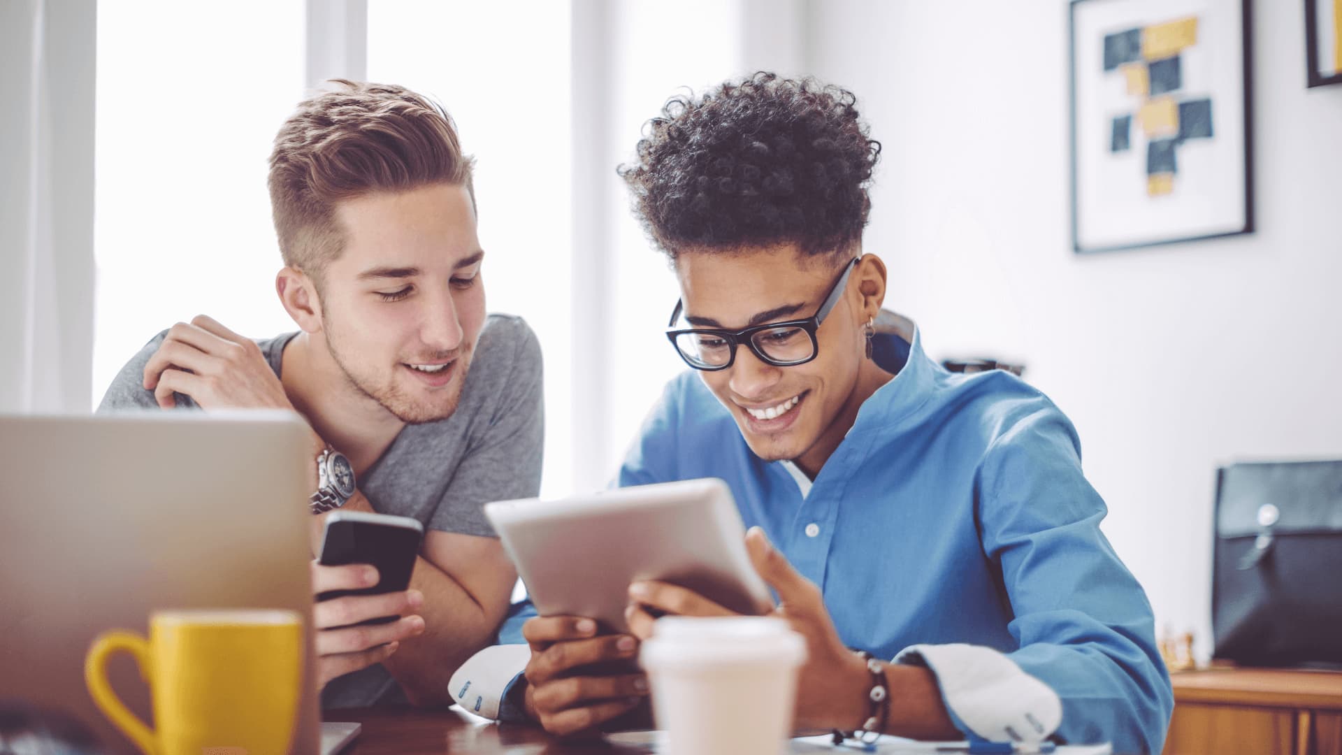 Students at home researching online degrees to study after college in the UK.