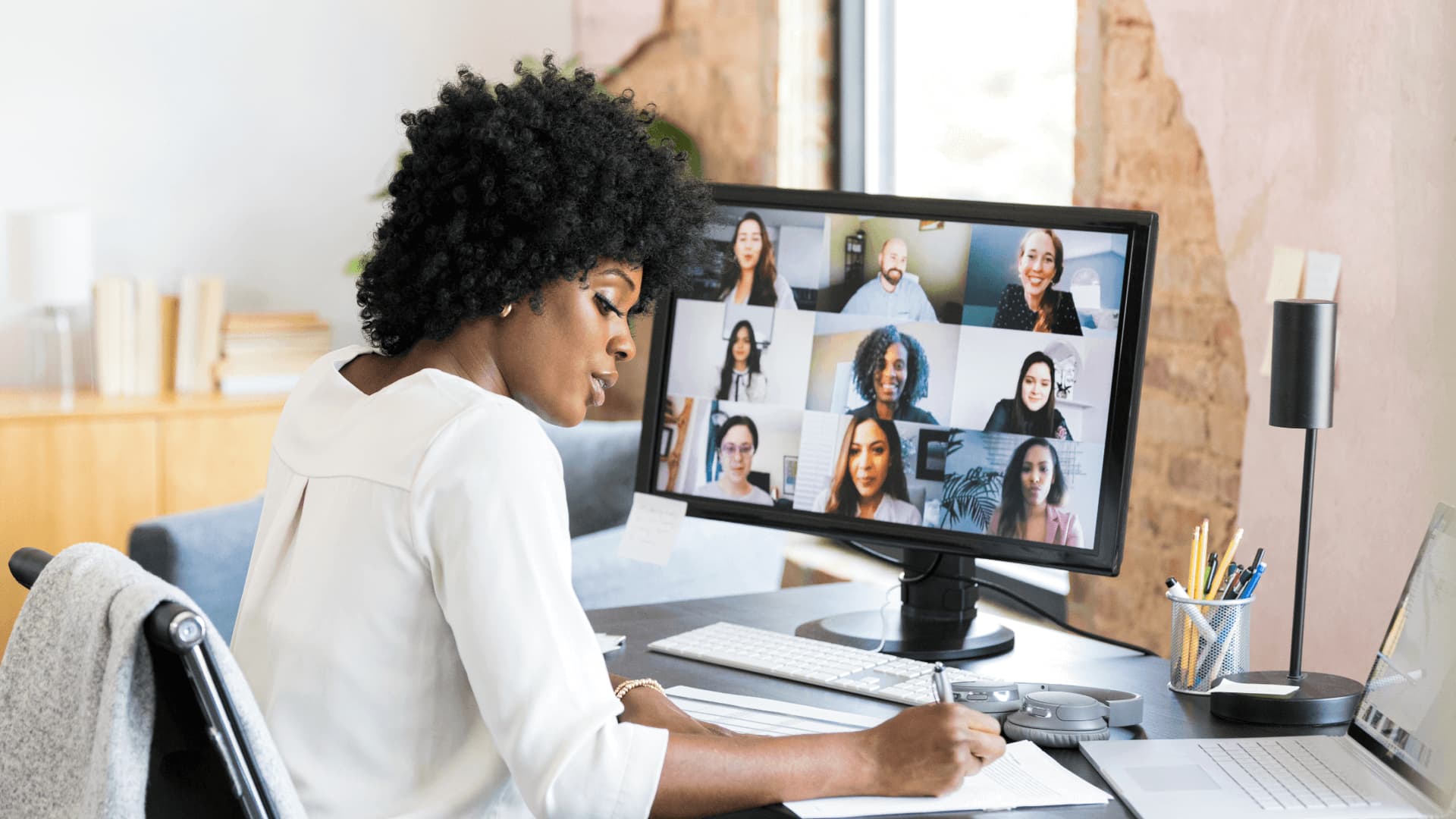 Distance learning student in a virtual learning environment classroom from home