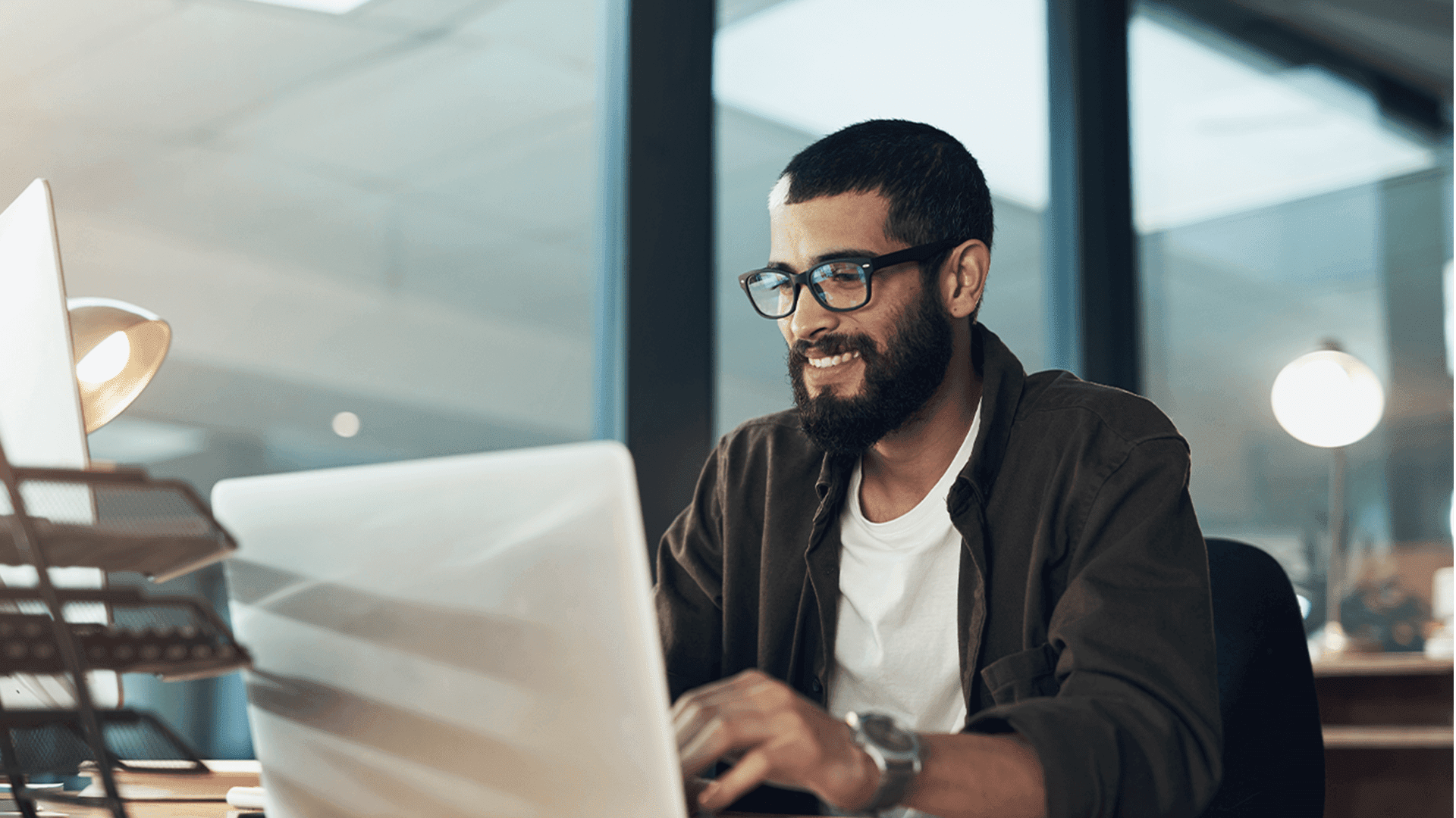 Man studying to become a data engineer from office.