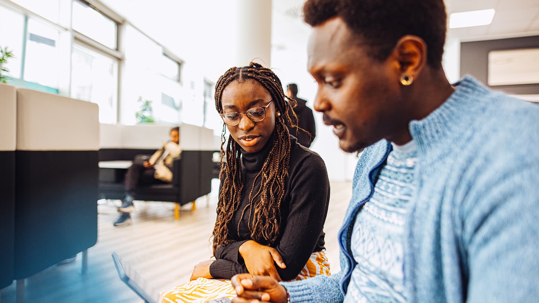 Two students looking for job offers