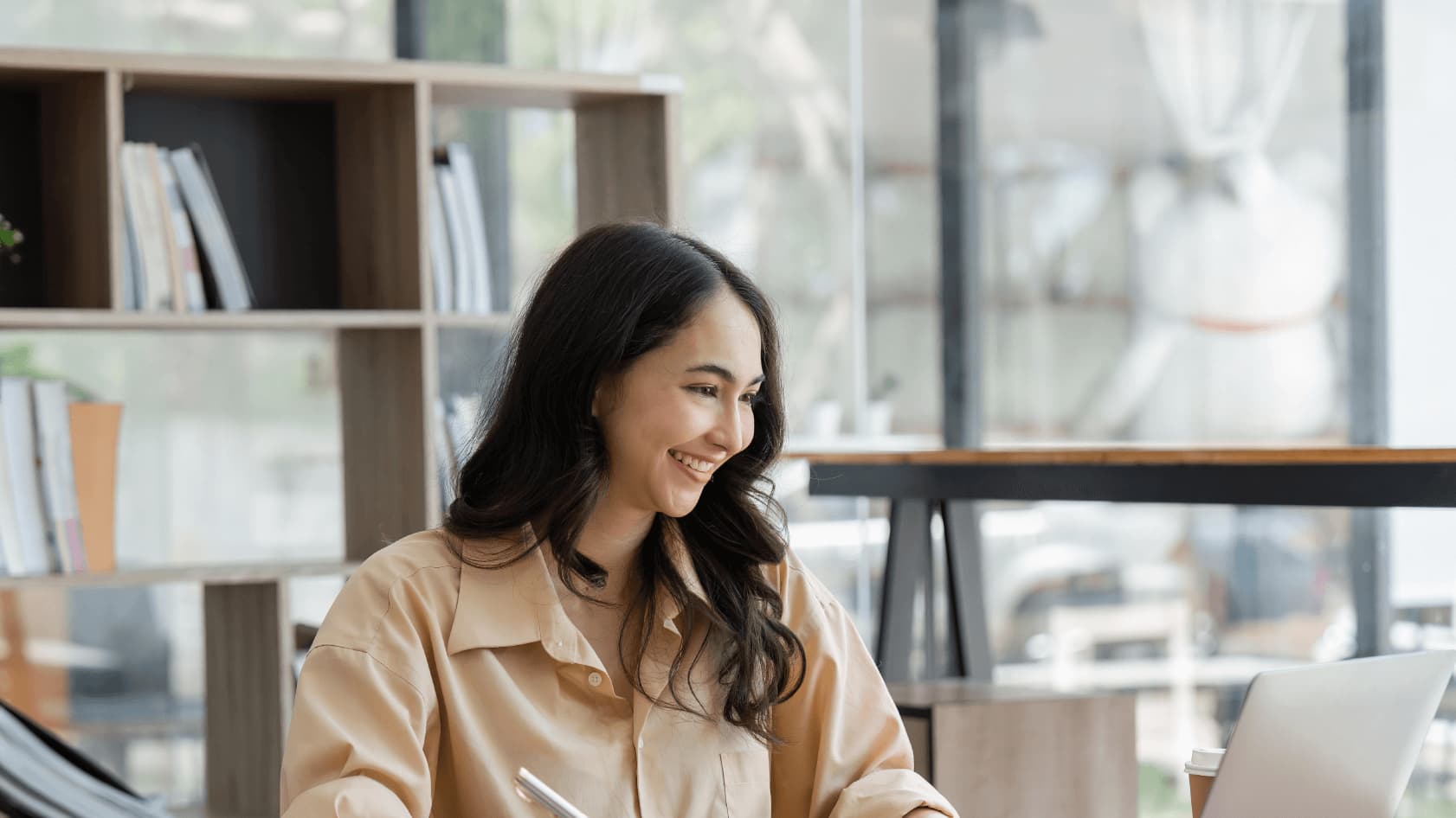 Woman starting a degree in January working in lunch break