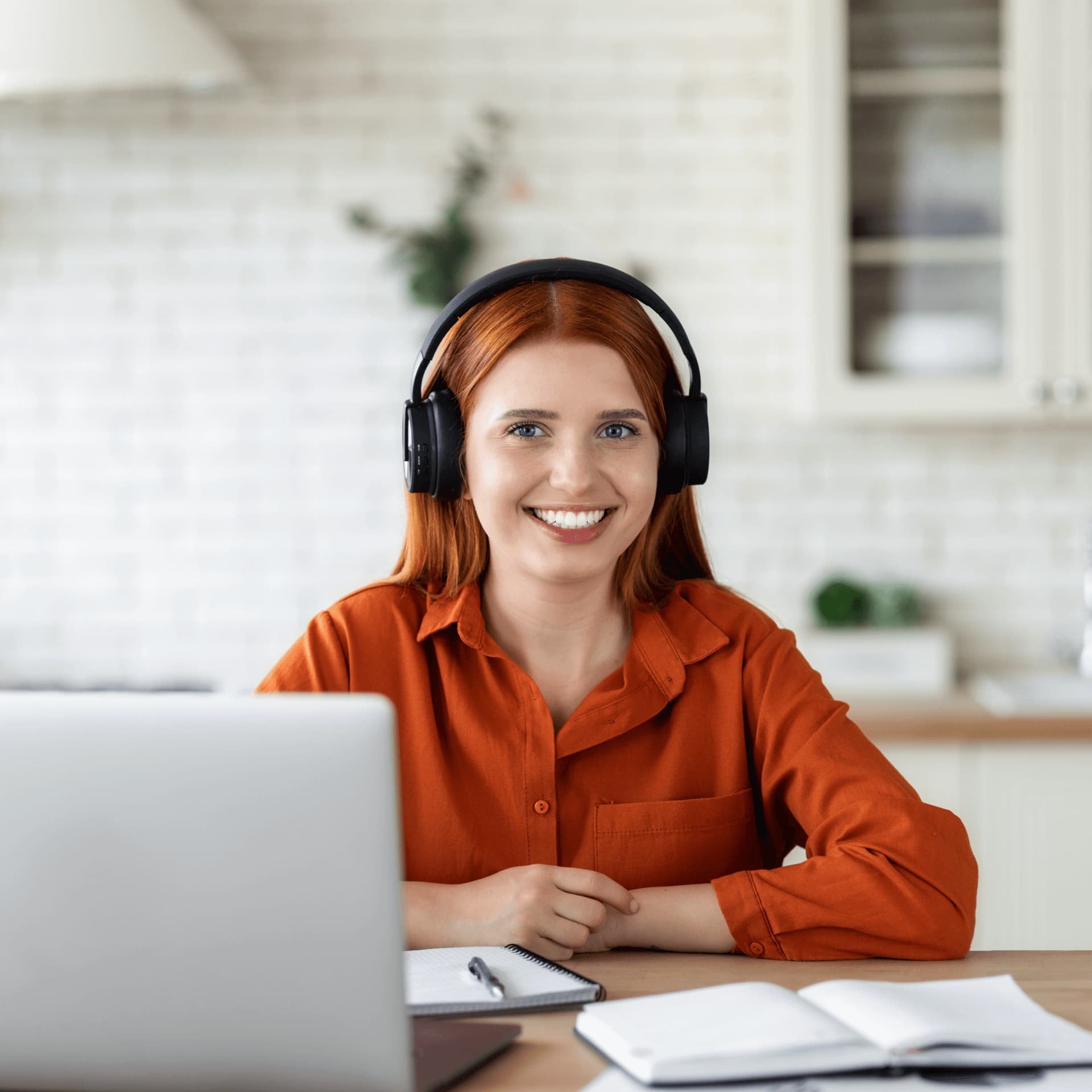 Distance learning student studying a degree from a laptop at home