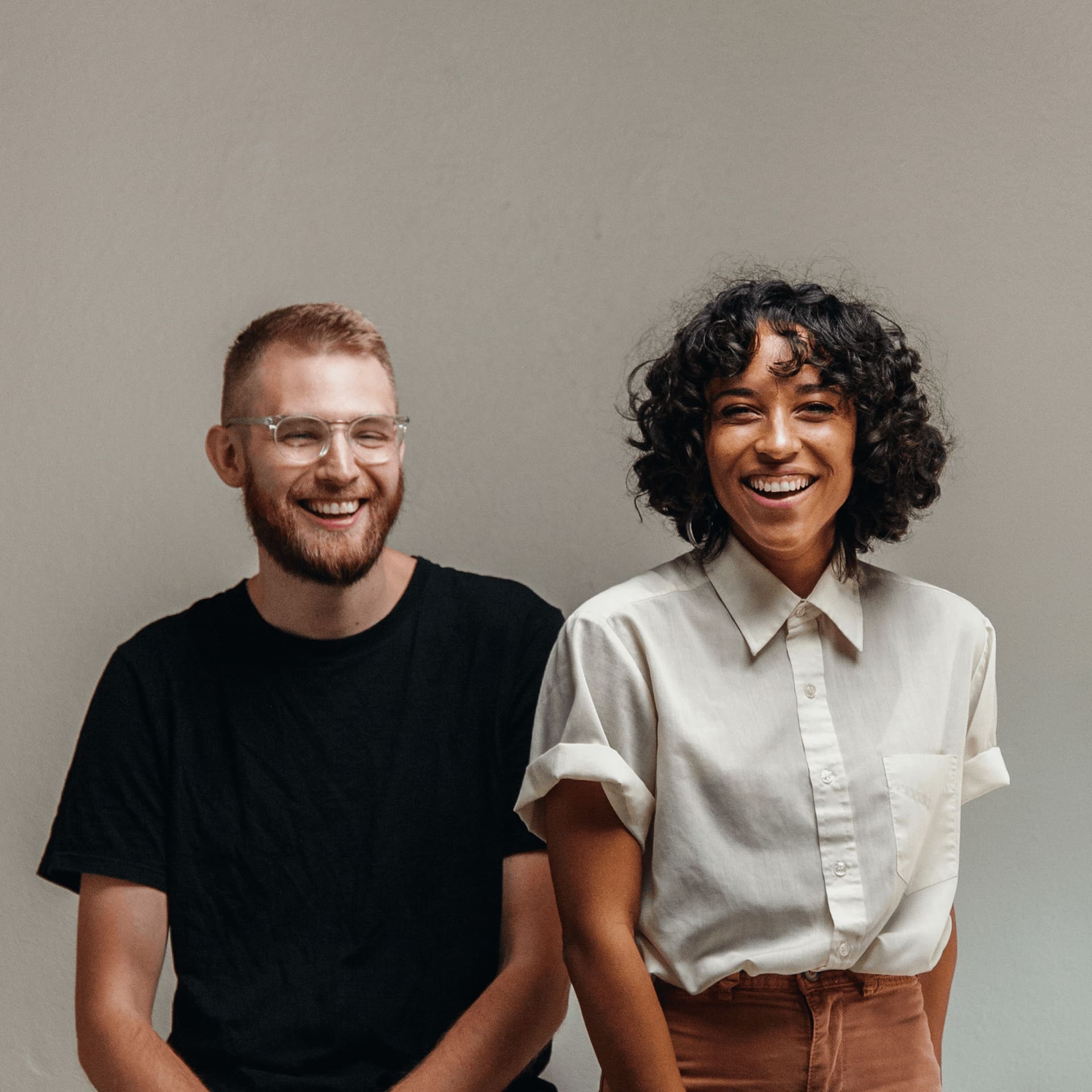 Two smiling LIBF online degree undergraduate and postgraduate students.