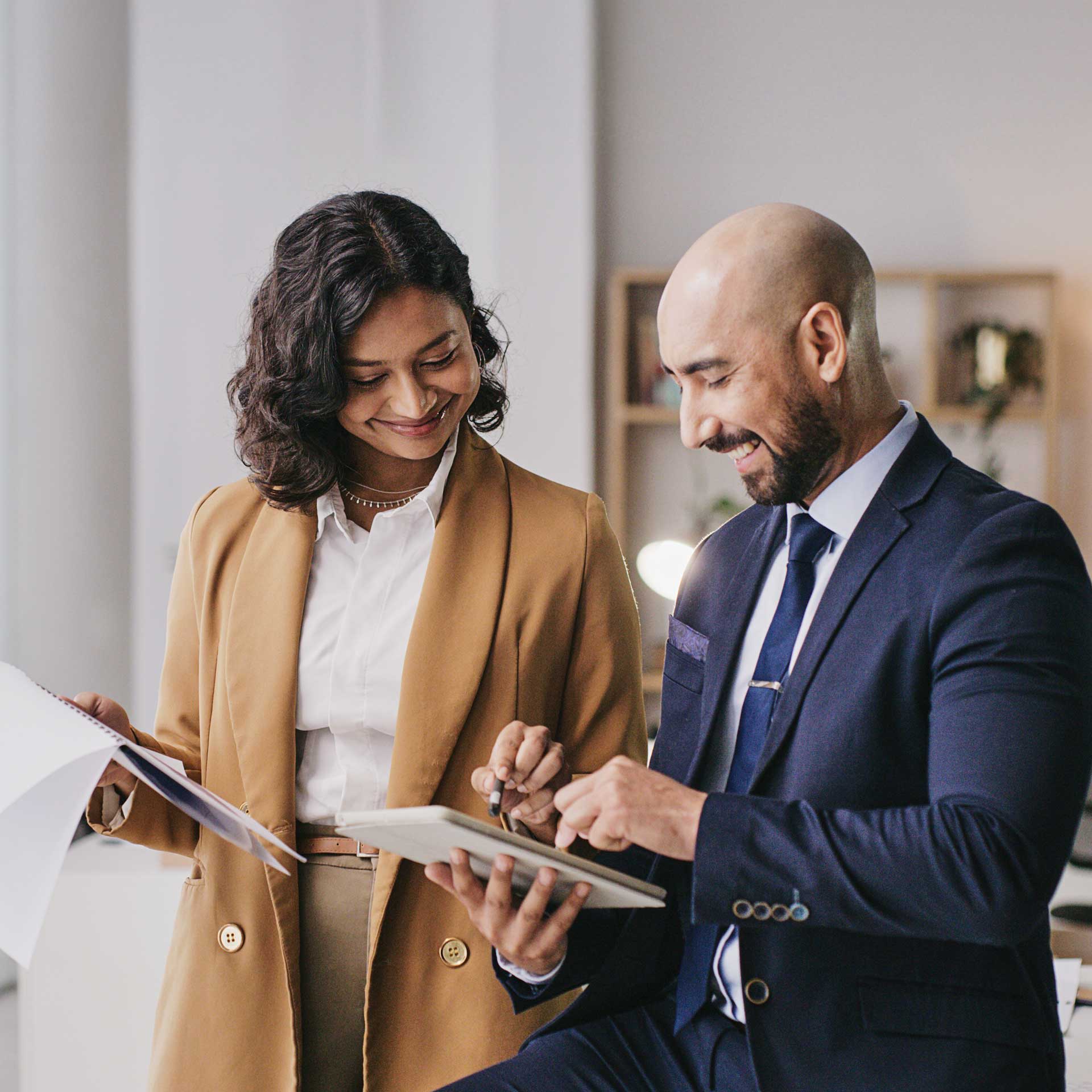 Business colleagues collaborating after completing their MBA degrees online