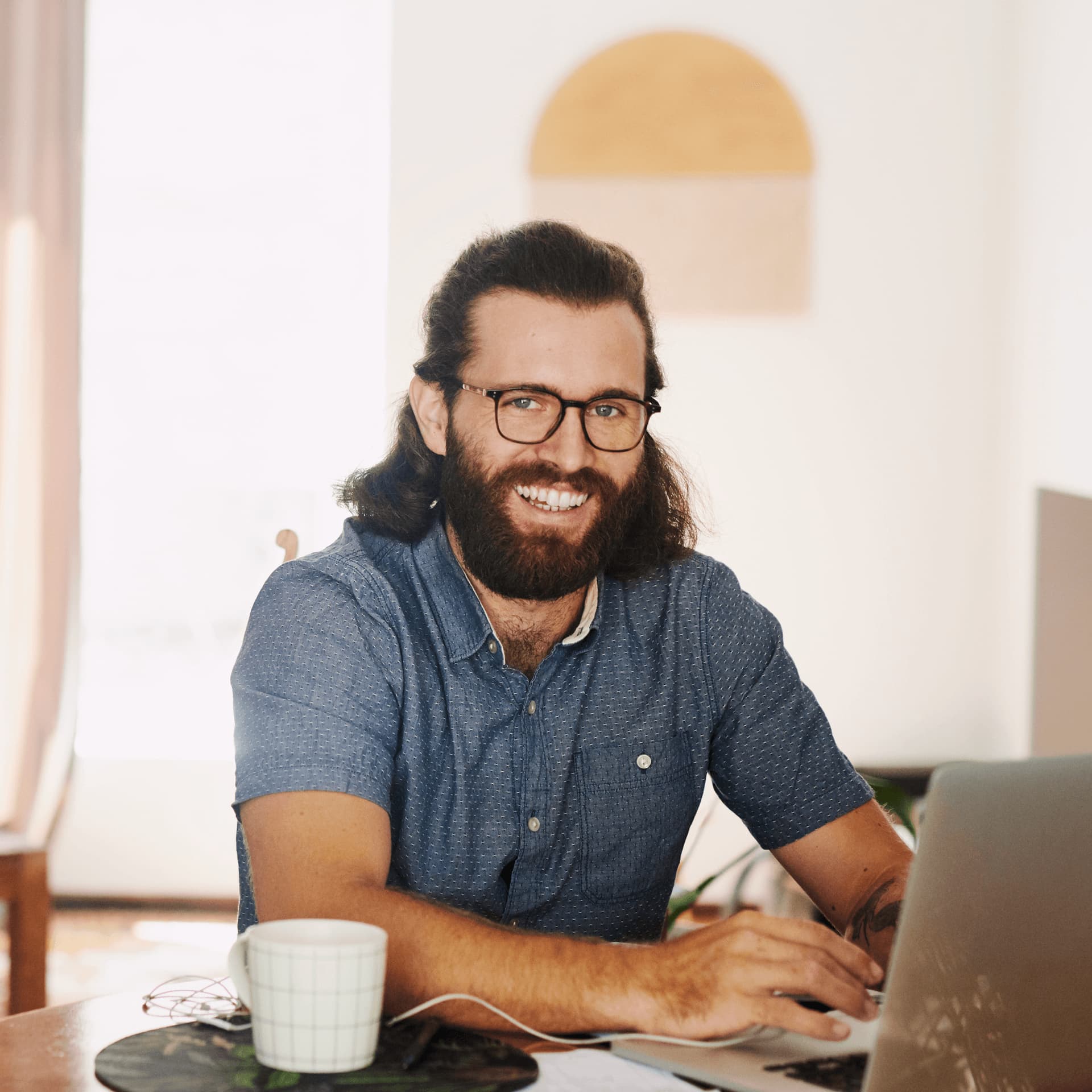 Professional working and studying from laptop at home