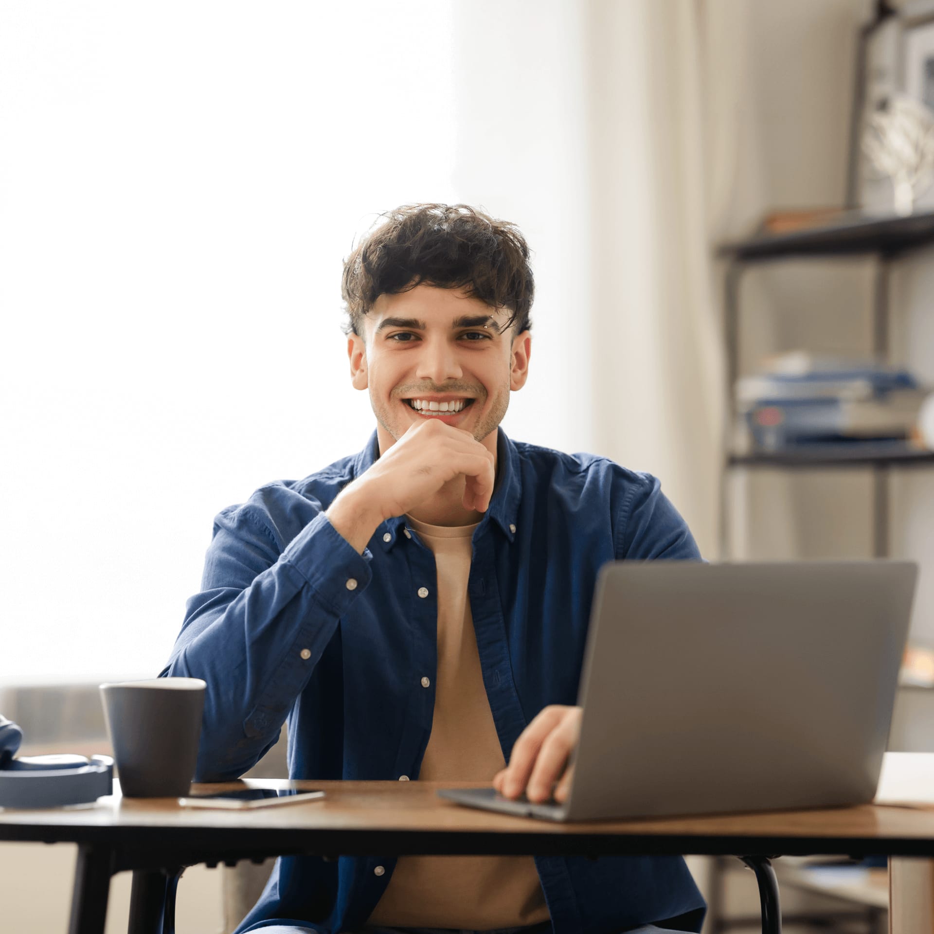 Male student studying from home starting their degree in january