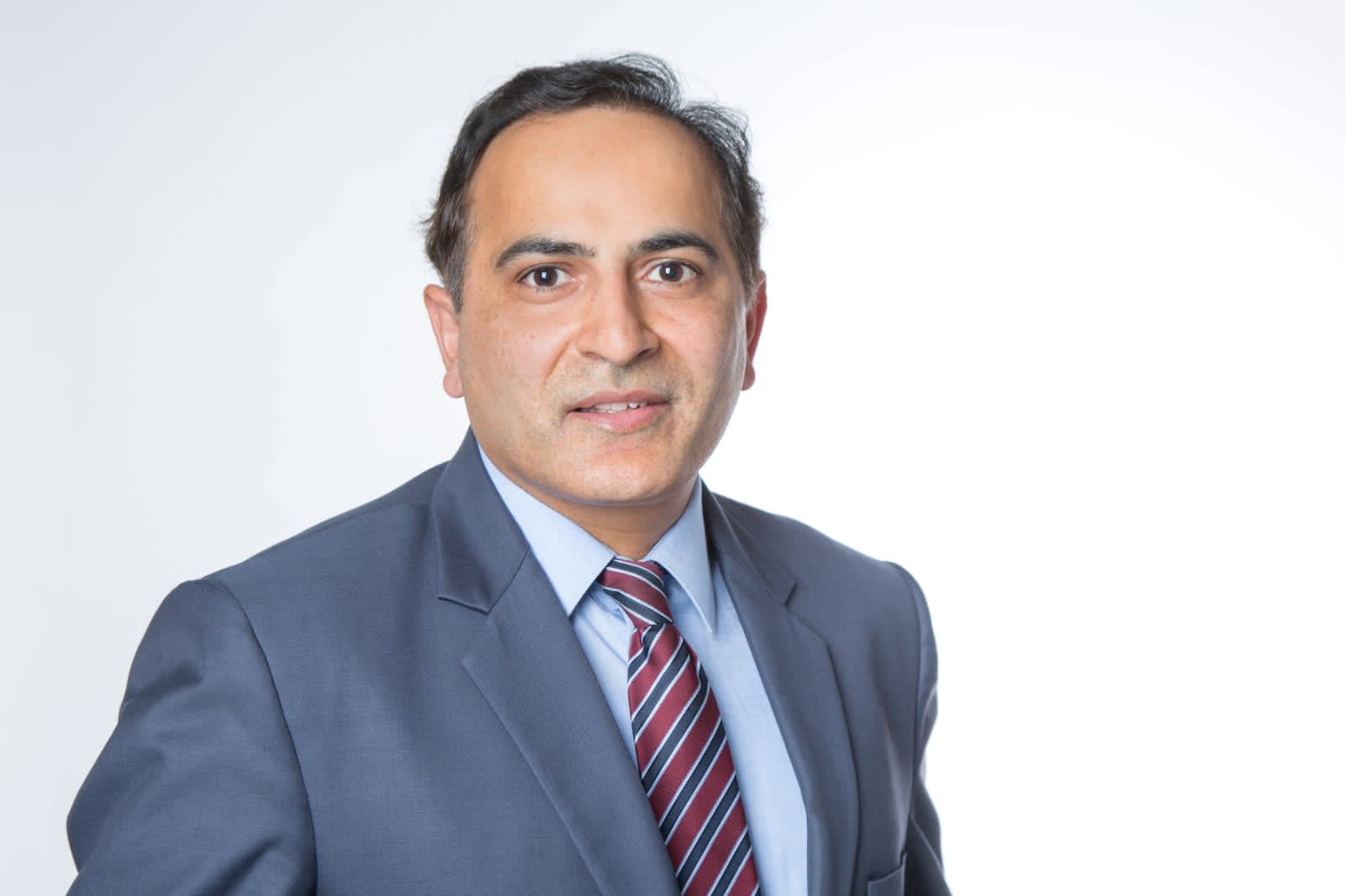 Professor of the B.A. Digital Business, Dr. Muhammad Ashfaq, sitting in front of the camera