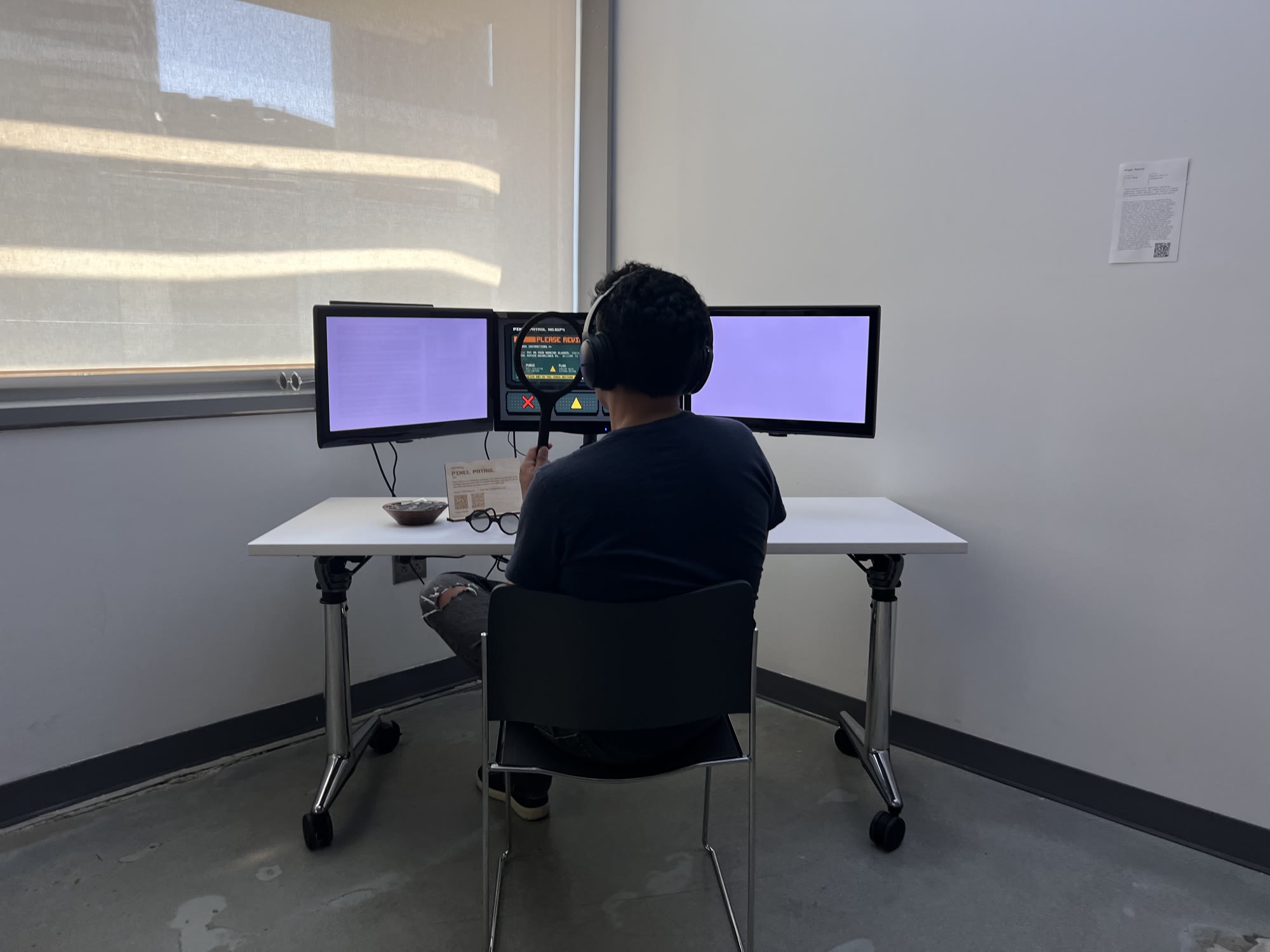 From behind, the screen reads as blank