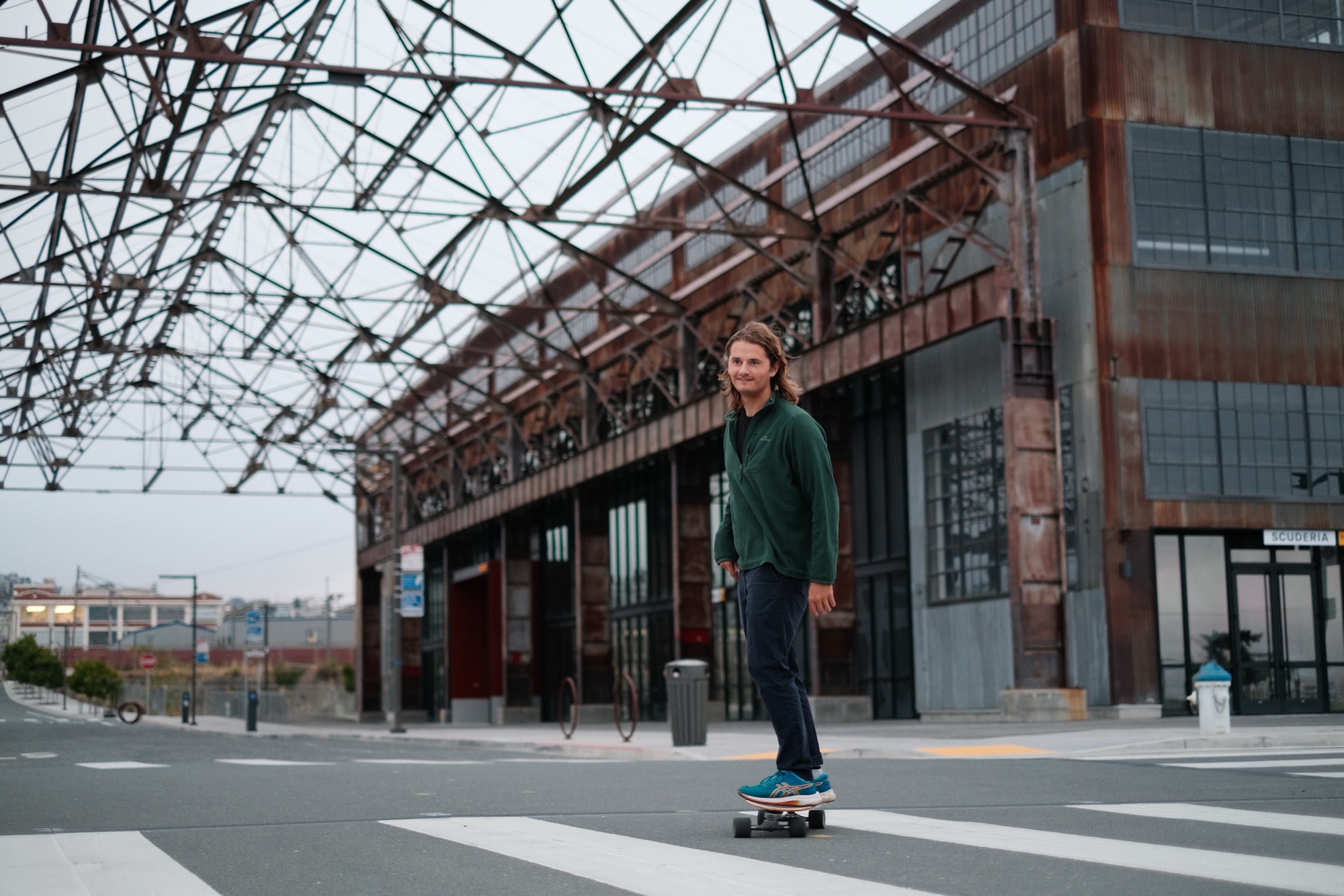 Laurence on his board under the old pier structure