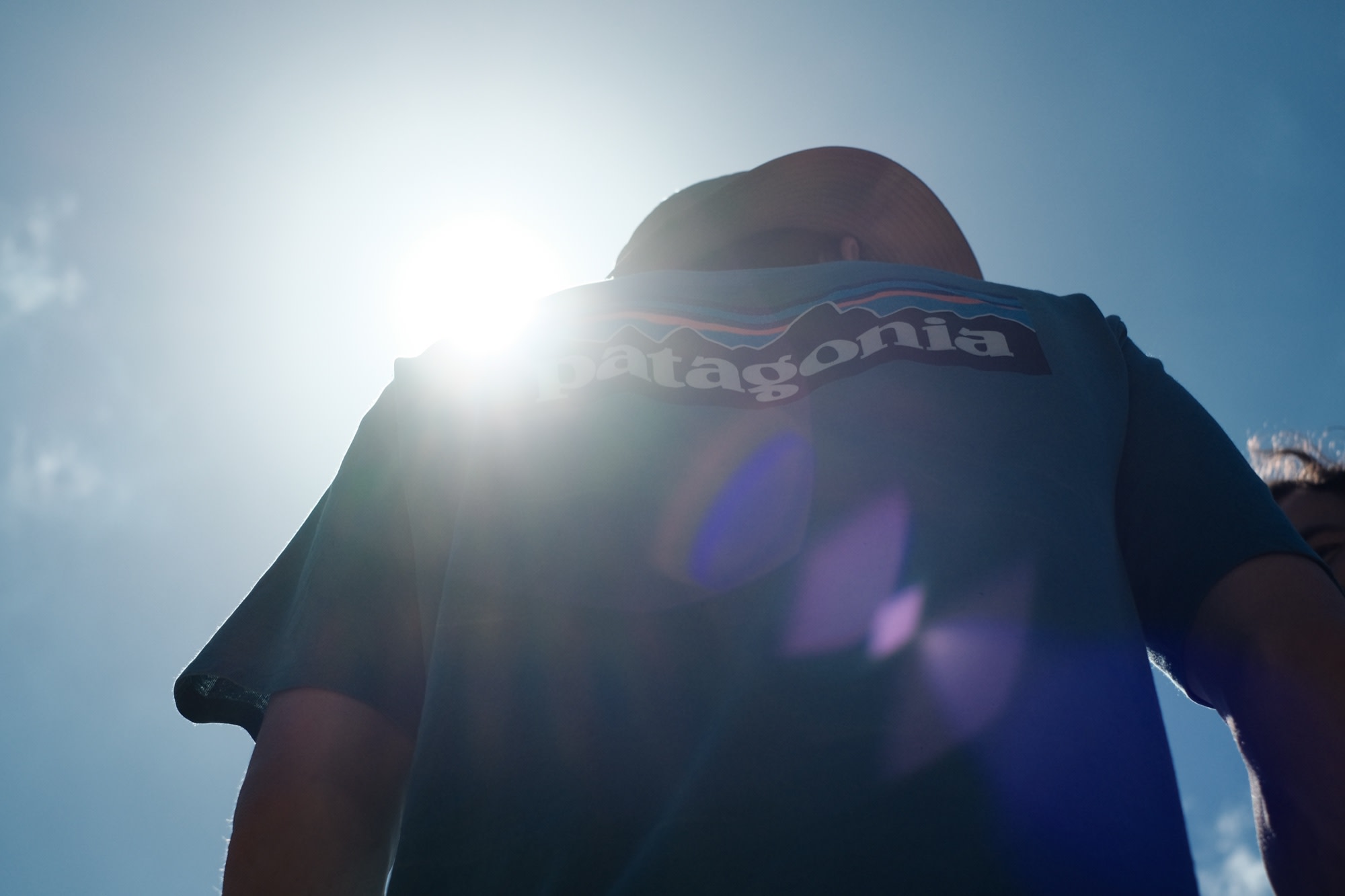 A Patagonia tee backlit by the sun