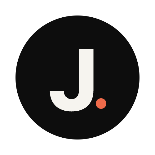 J.