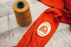 “Buy Less Skiwear To Save the Planet” Says Skiwear Manufacturer