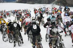 Biking Downhill Over Snow In Cervinia