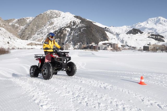 E-Quad Riding On Swiss Snow