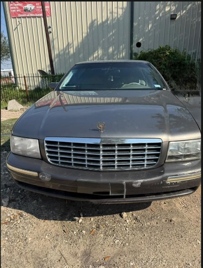 1998 Cadillac DeVille Full-Size Luxury Sedan available for rent from M3 Rental in Houston
