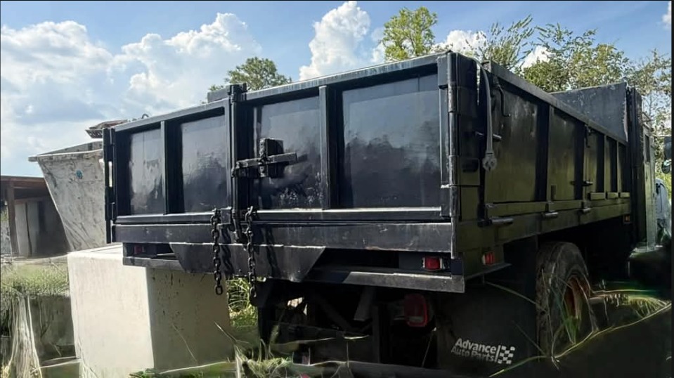 Heavy-Duty Black Dump Truck available for rent from M3 Rental in Houston