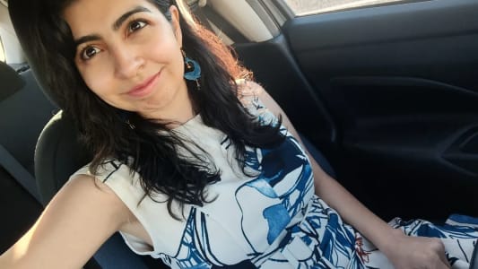 photo of customer wearing earrings