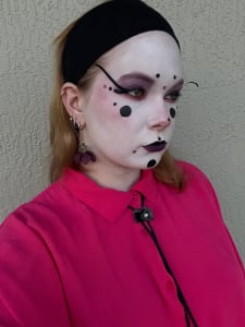 photo of customer wearing earrings