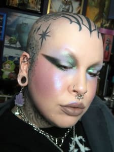 photo of customer wearing earrings