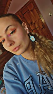 photo of customer wearing earrings