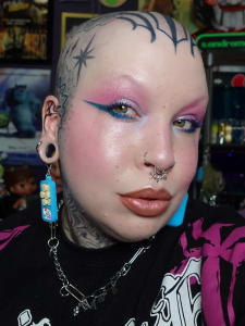 photo of customer wearing earrings
