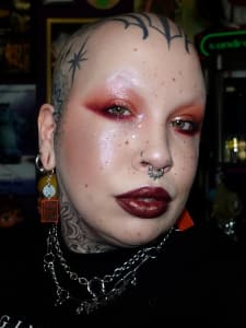 photo of customer wearing earrings