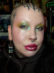 photo of customer wearing earrings
