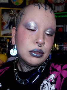 photo of customer wearing earrings