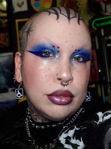 photo of customer wearing earrings